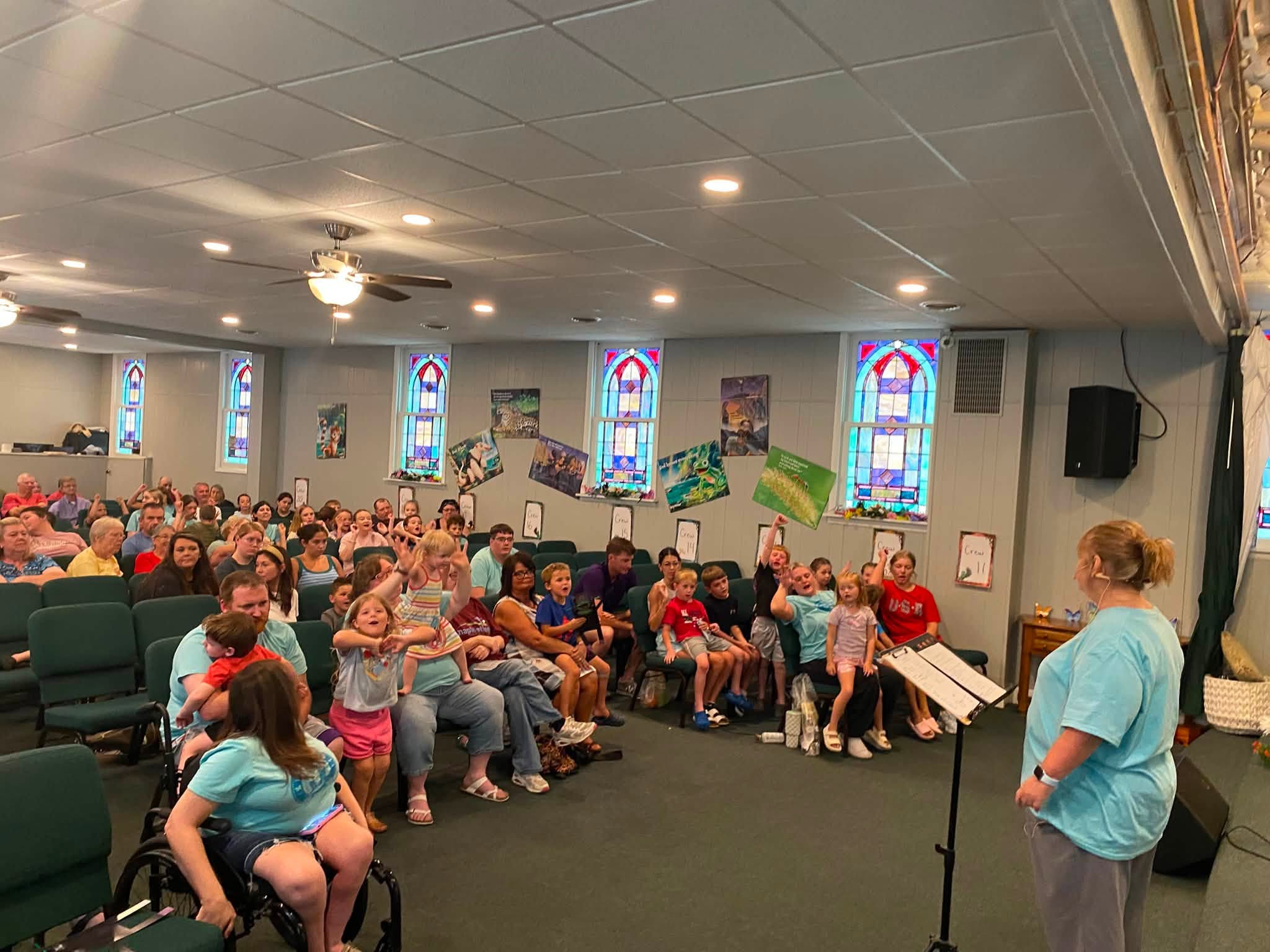 Children and families participating together during a VBS gathering in the church