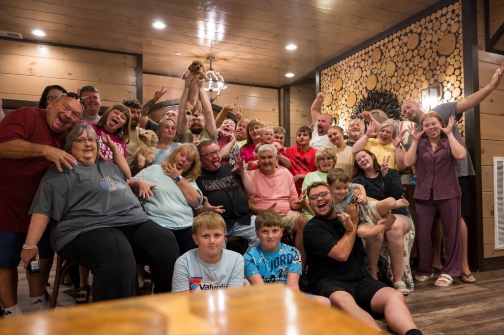 Maple Street church family smiling together for a group photo