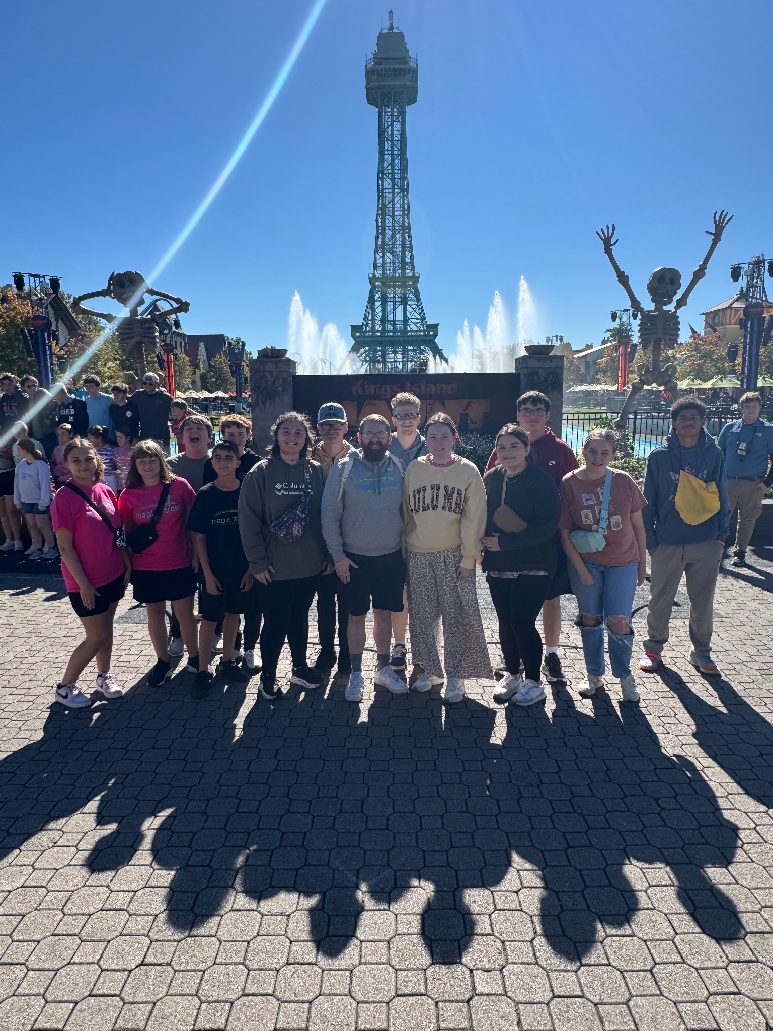 Element 412 group posing together at an amusement park