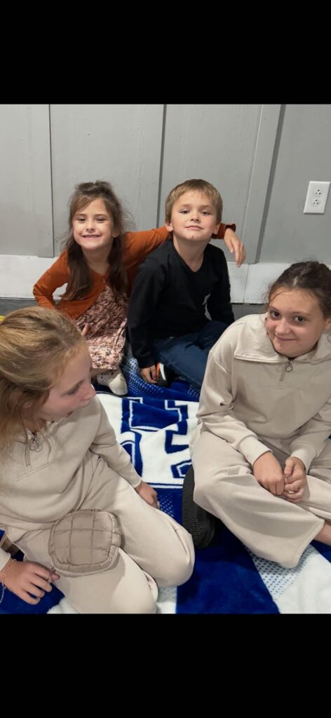 Children and a leader spending time together